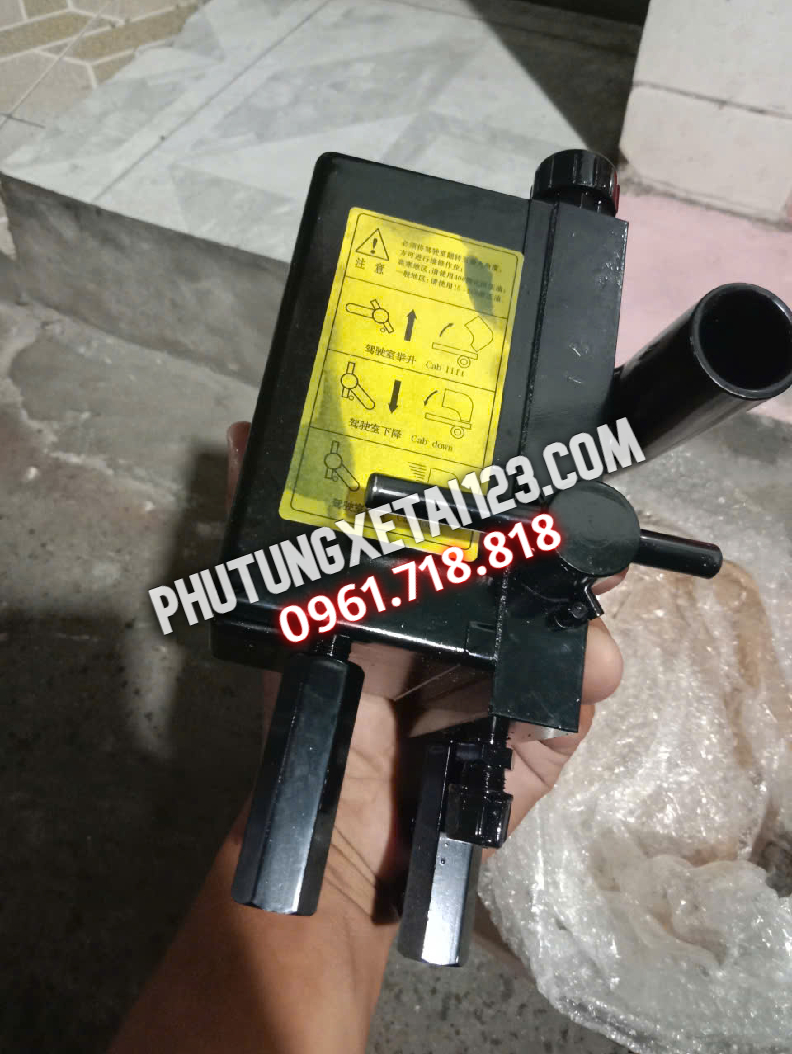 bơm nâng cabin daewoo novus